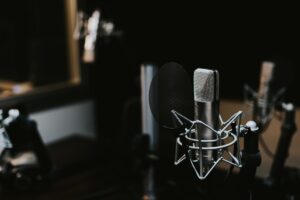 Podcast microphone, headphones and recording setup
